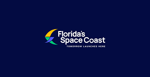 Front of fliping box that shows - Florida's Space Coast Logo with tag line that reads Tomorrow Launches Here